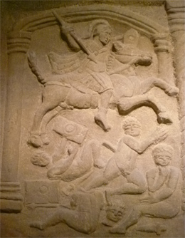 The Bridgeness Slab depicting Roman Cavalry attacking Caledonian warriors.